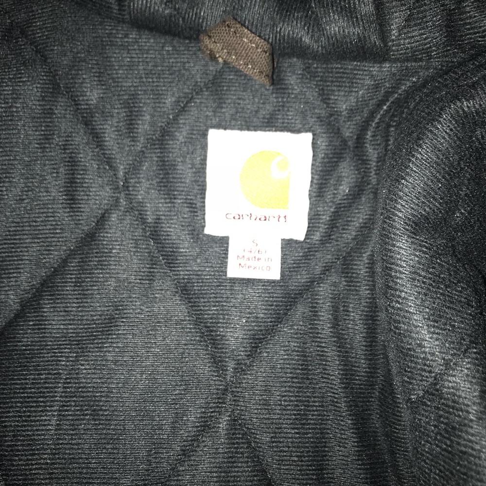 Women’s size Small dark brown carhartt jacket.